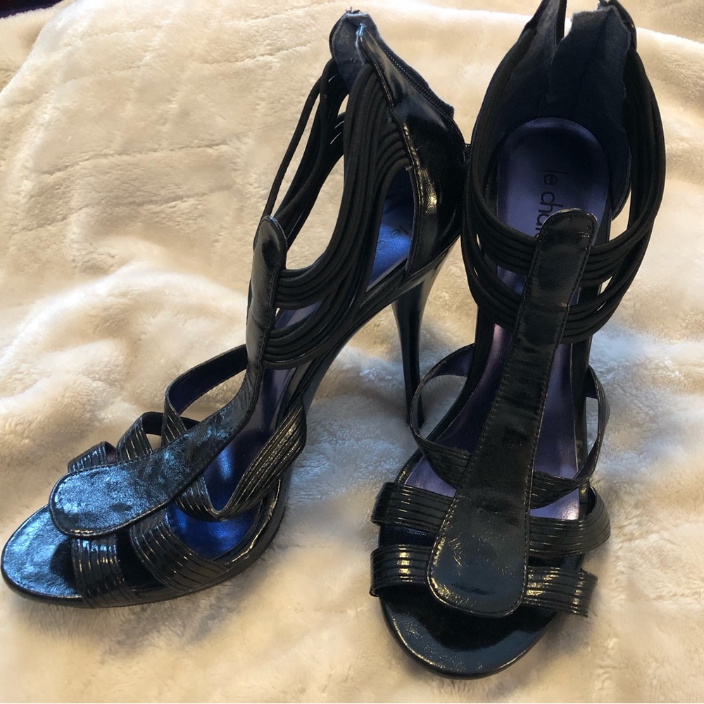Le Chateau stilettos. Size 8. Fit normal to narrow feet. Black and purple.